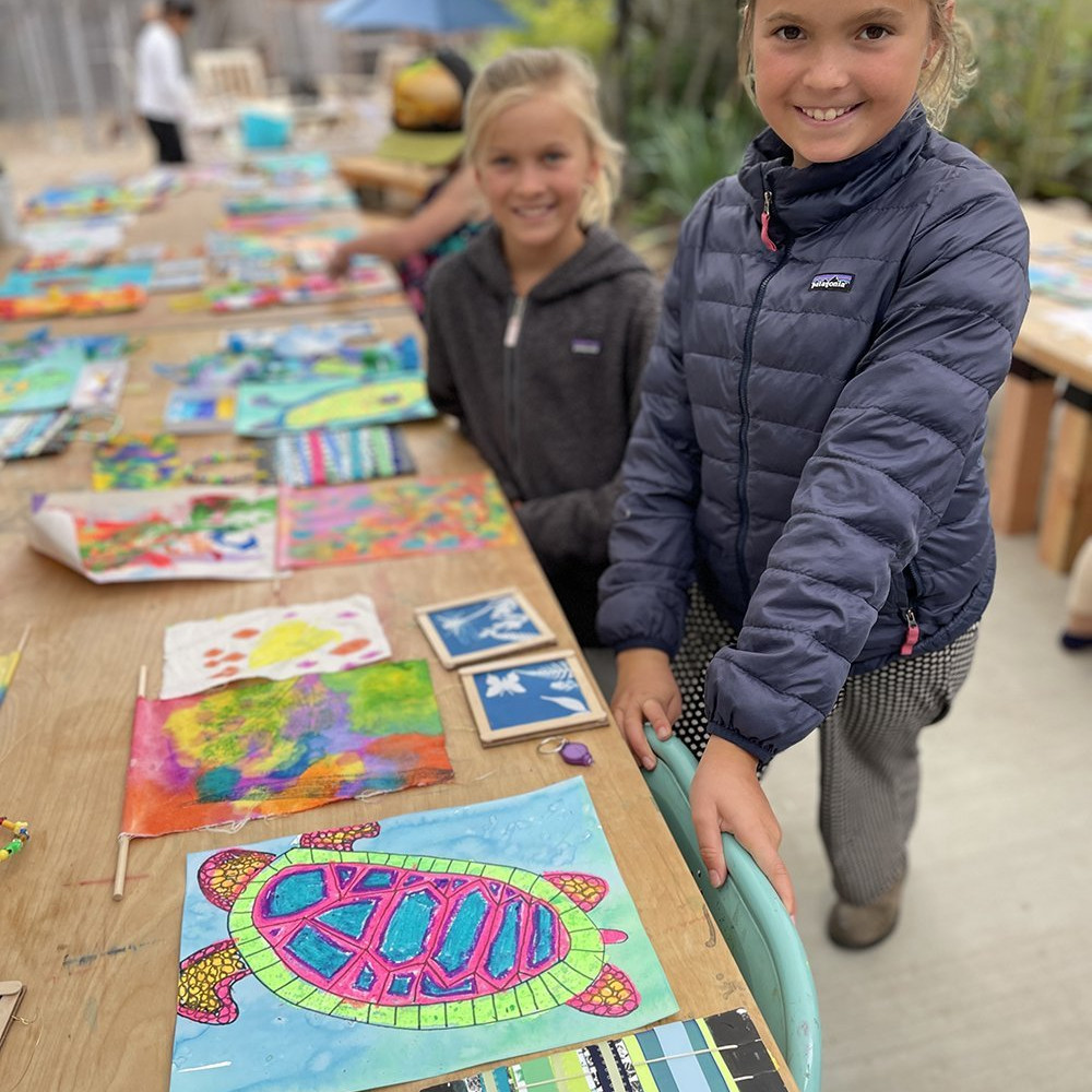 children making art outside