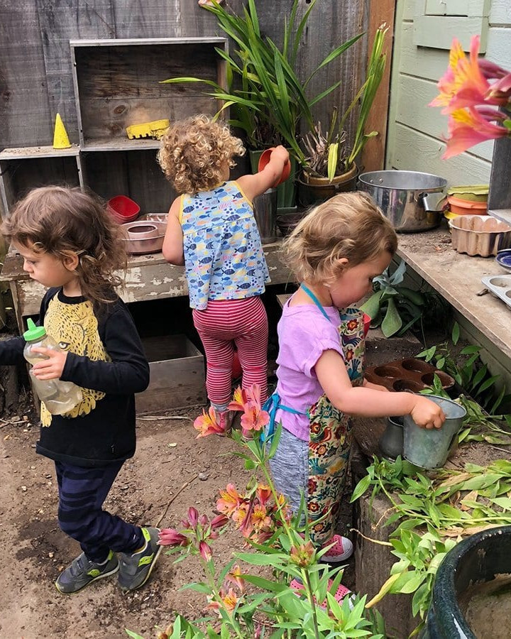 children playing outside in garden