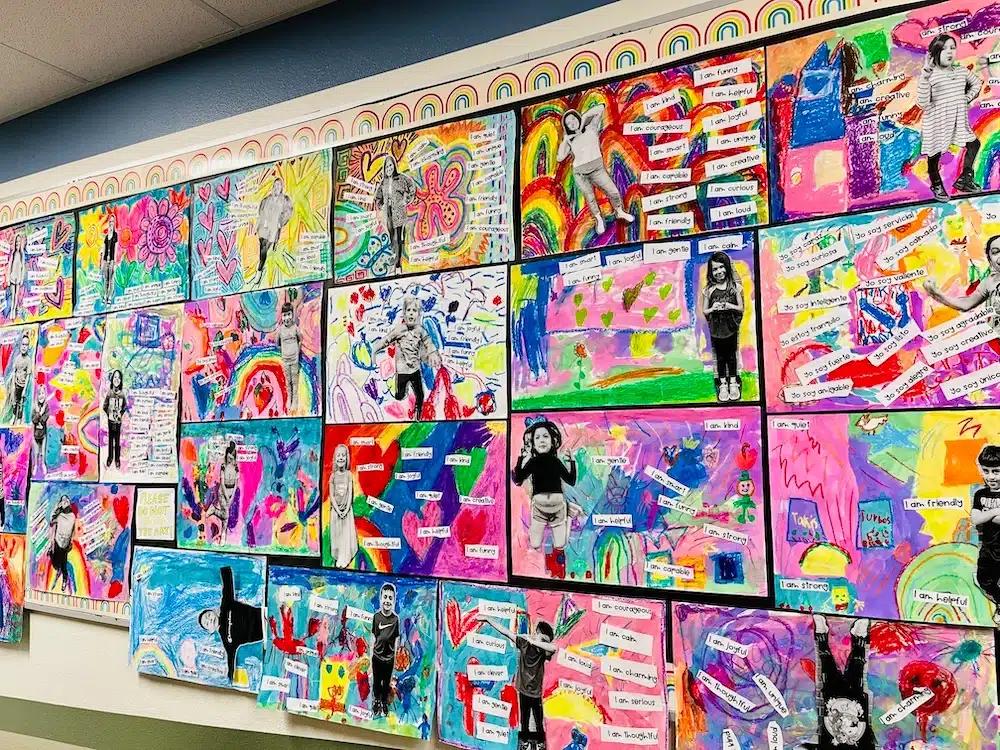 a wall of children's arts and crafts projects